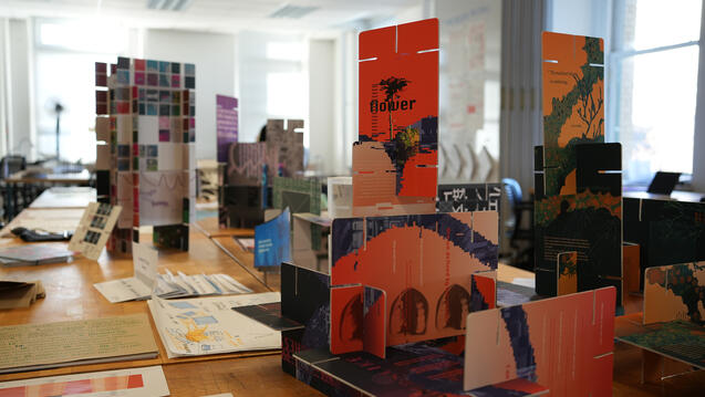 Some interlocking cards on display in a studio