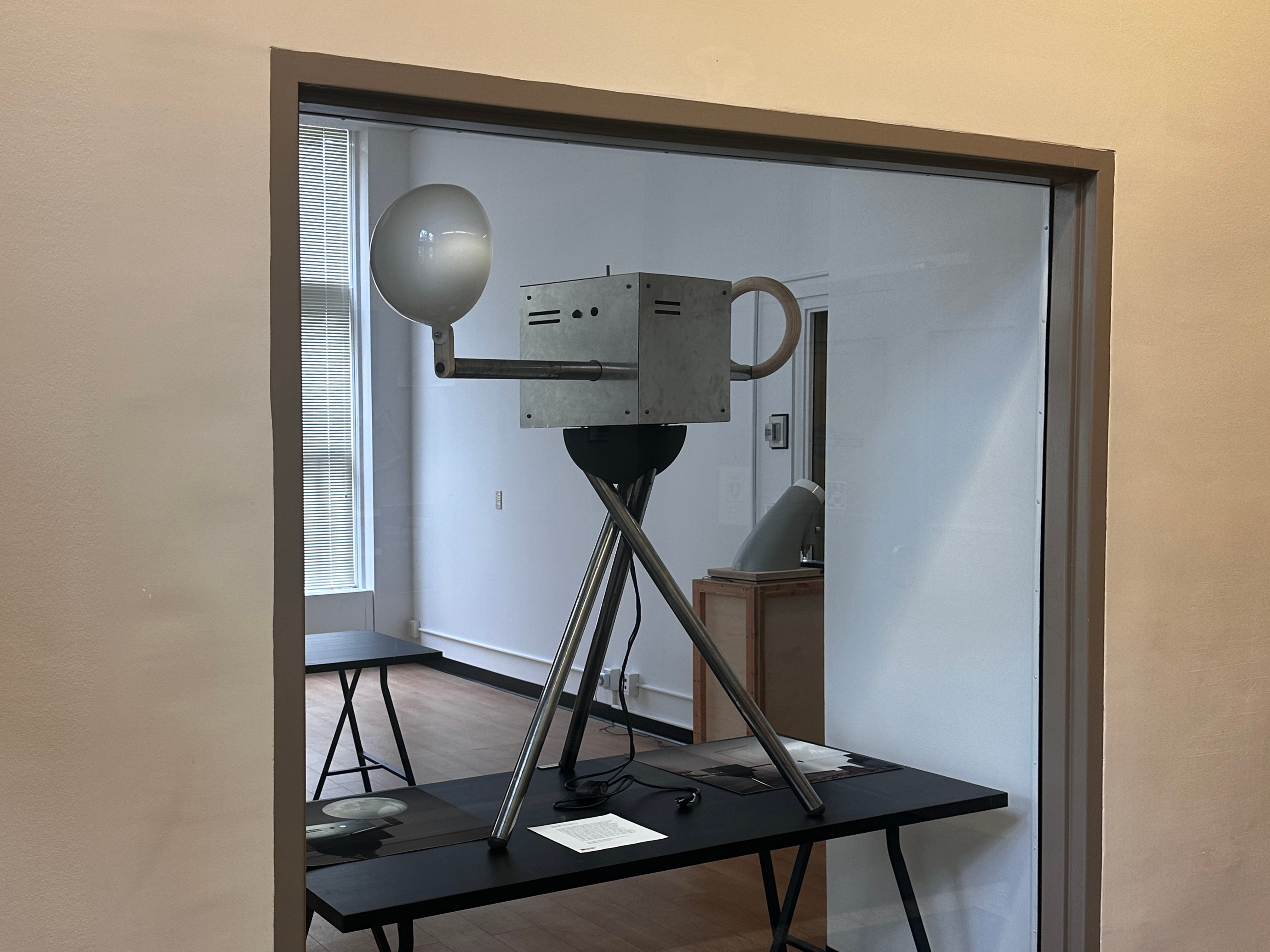 Image of panograph prototype sitting in display window on exhbition