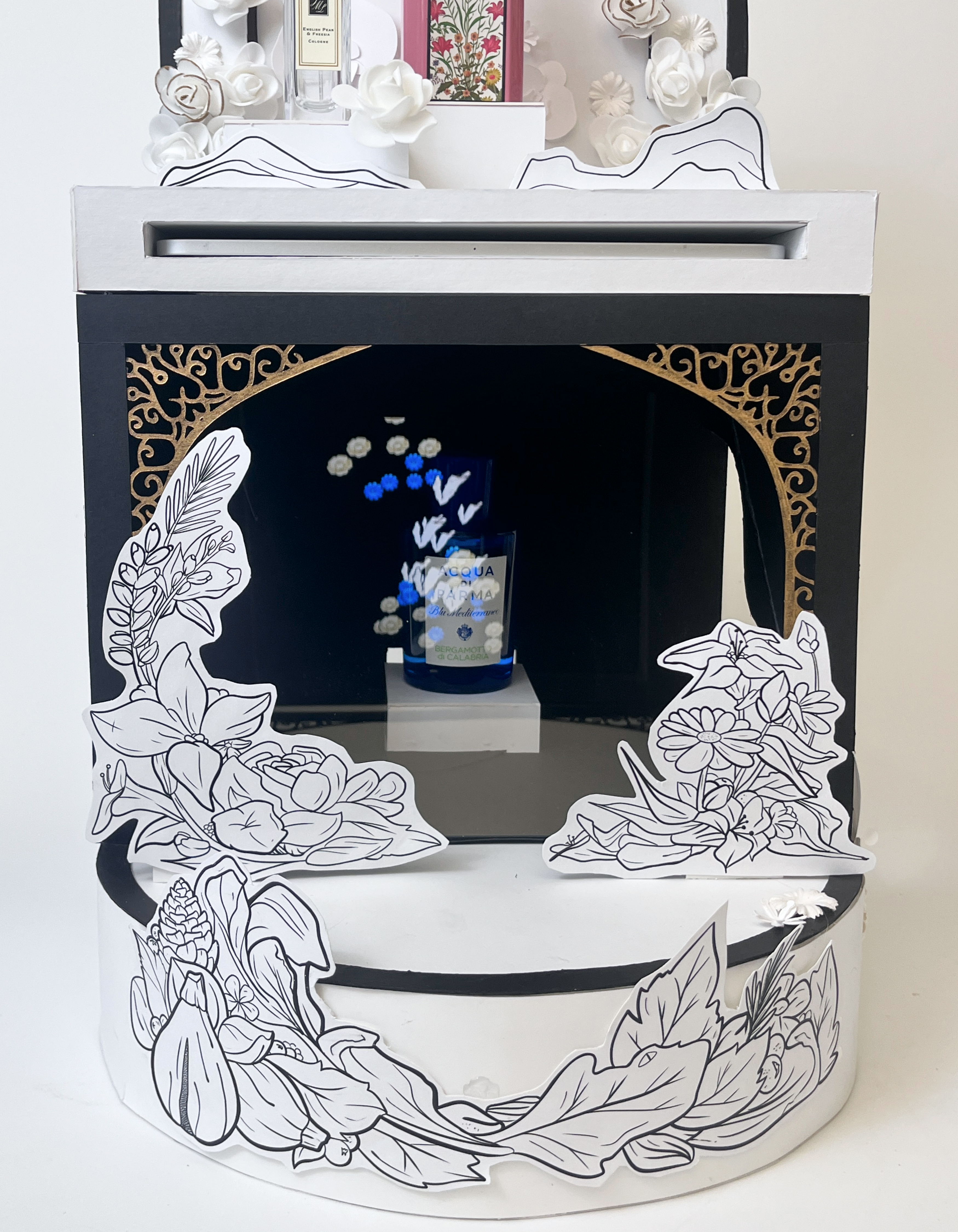 A bottle of perfume with a holographic effect