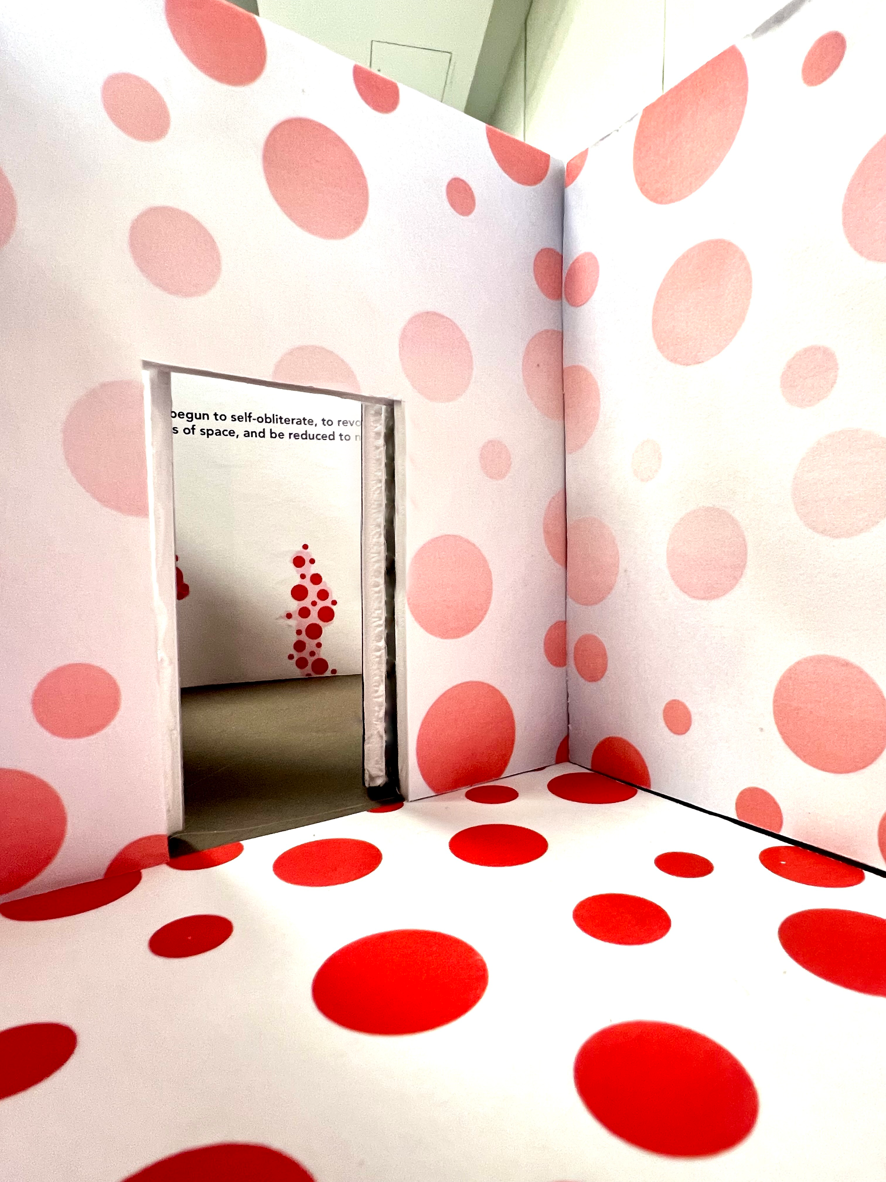 A model of a Yayoi Kusama exhibit