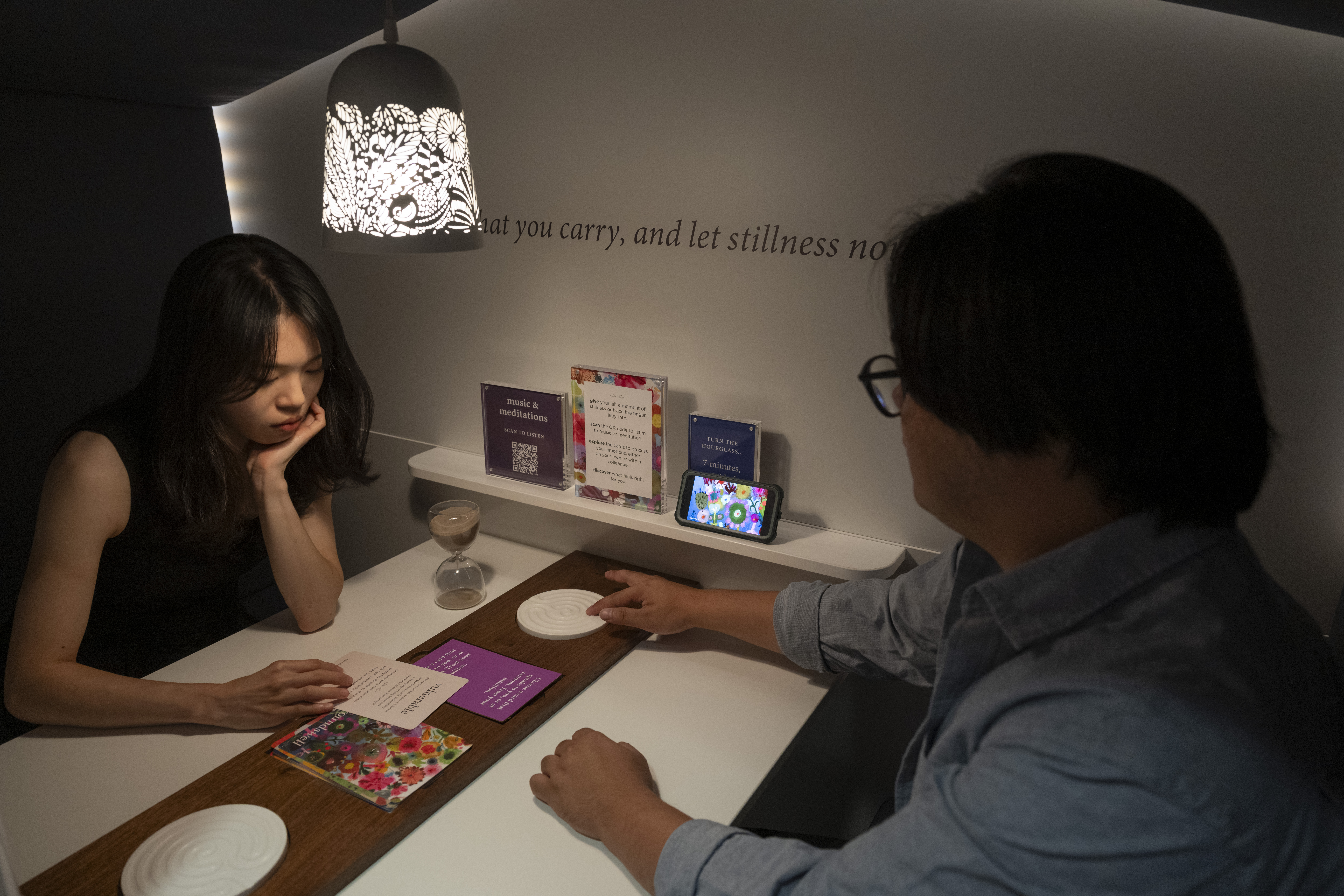 Two people interacting with the Groundswell Pod
