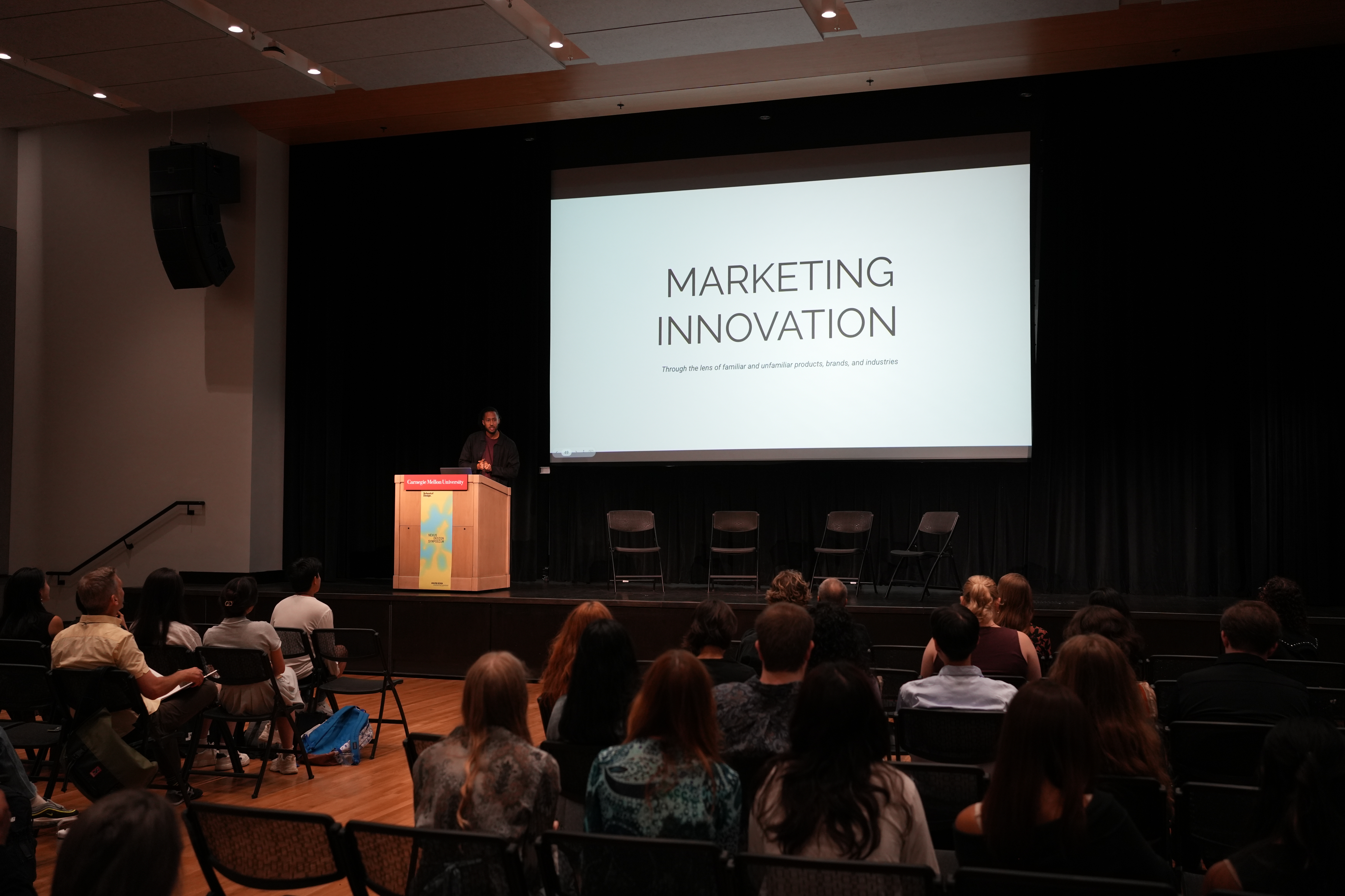 Nick Robinson speaking at the Nexus Design Symposium