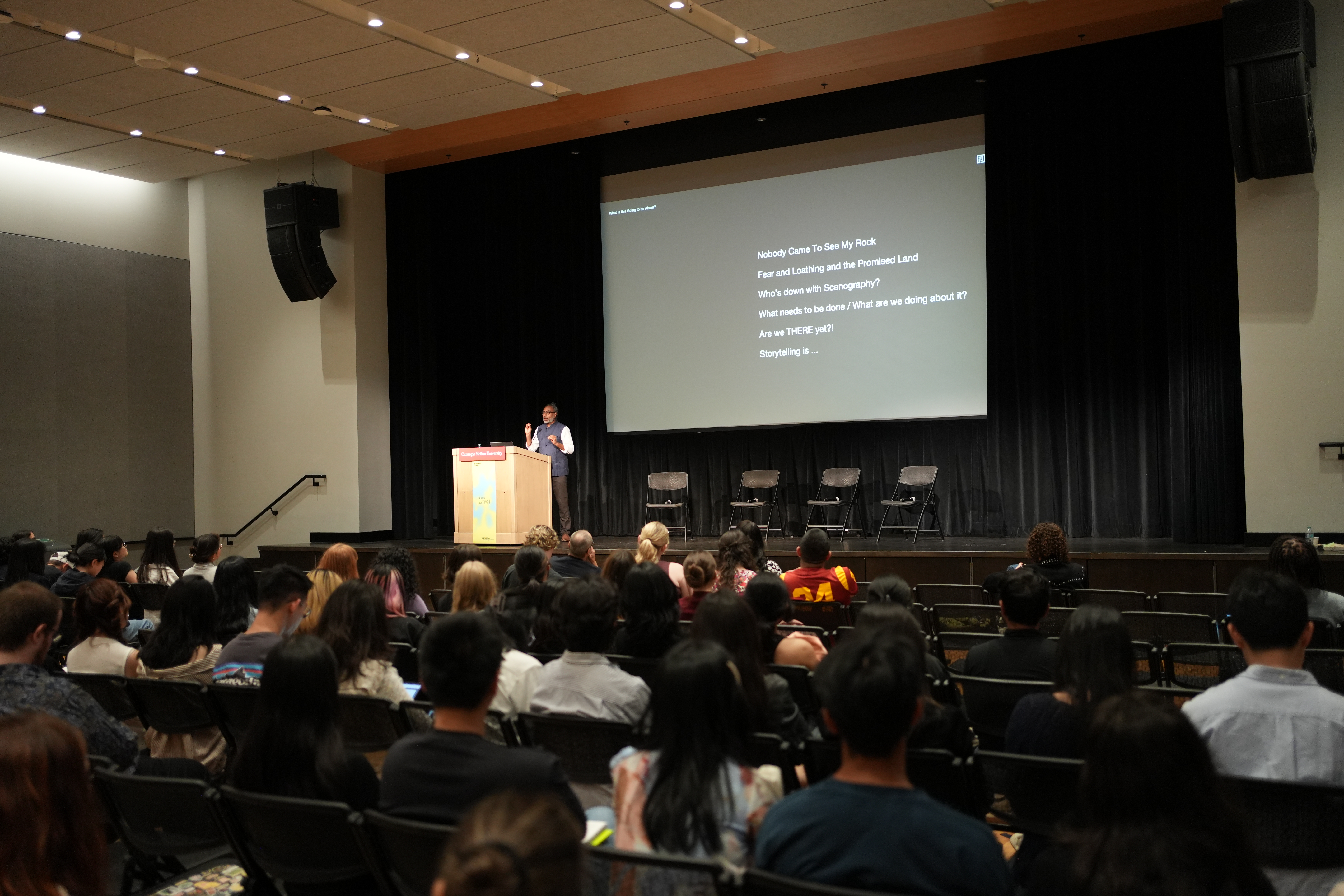 A speaker at the Nexus Design Symposium