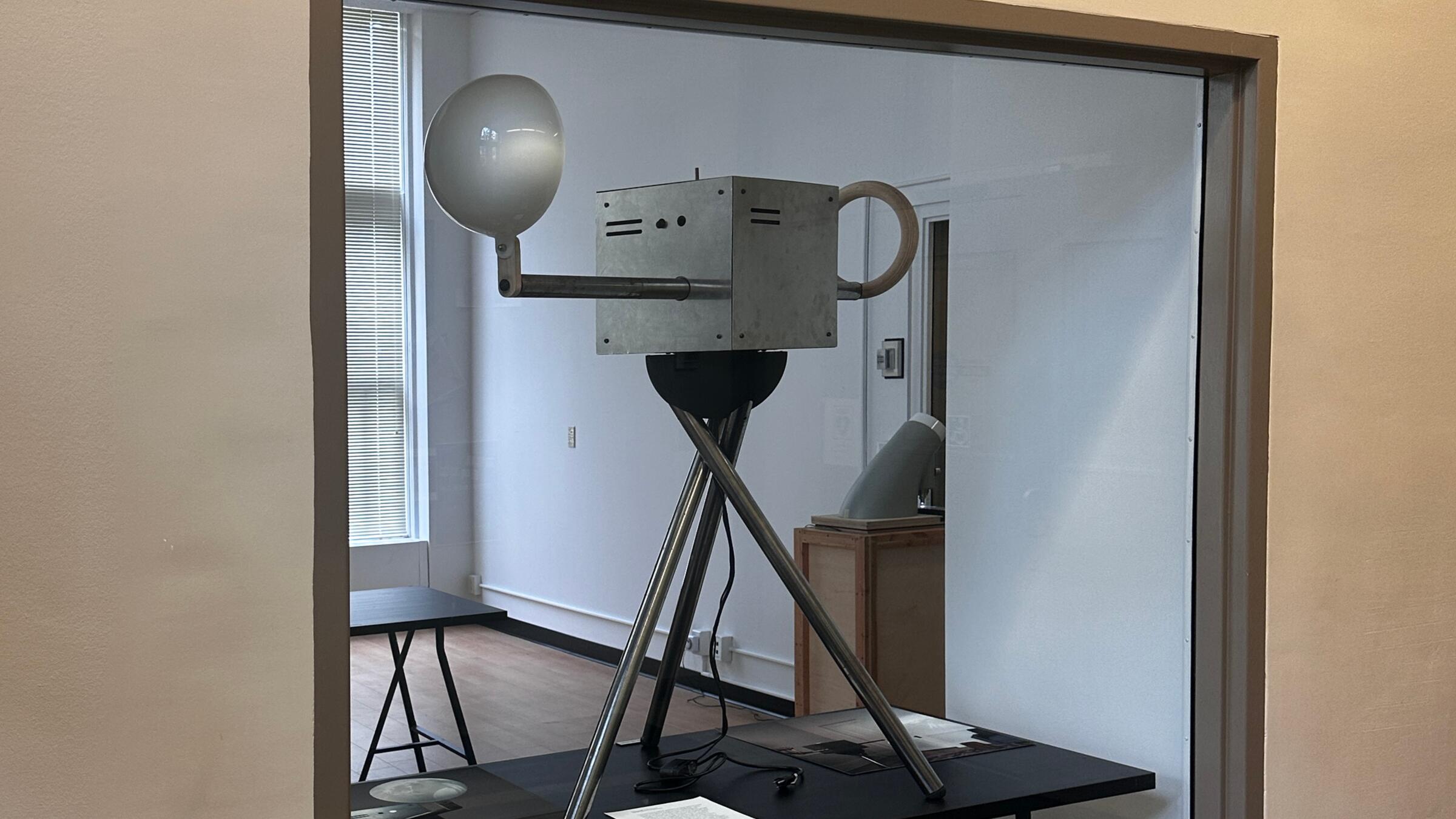 Image of panograph prototype sitting in display window on exhbition