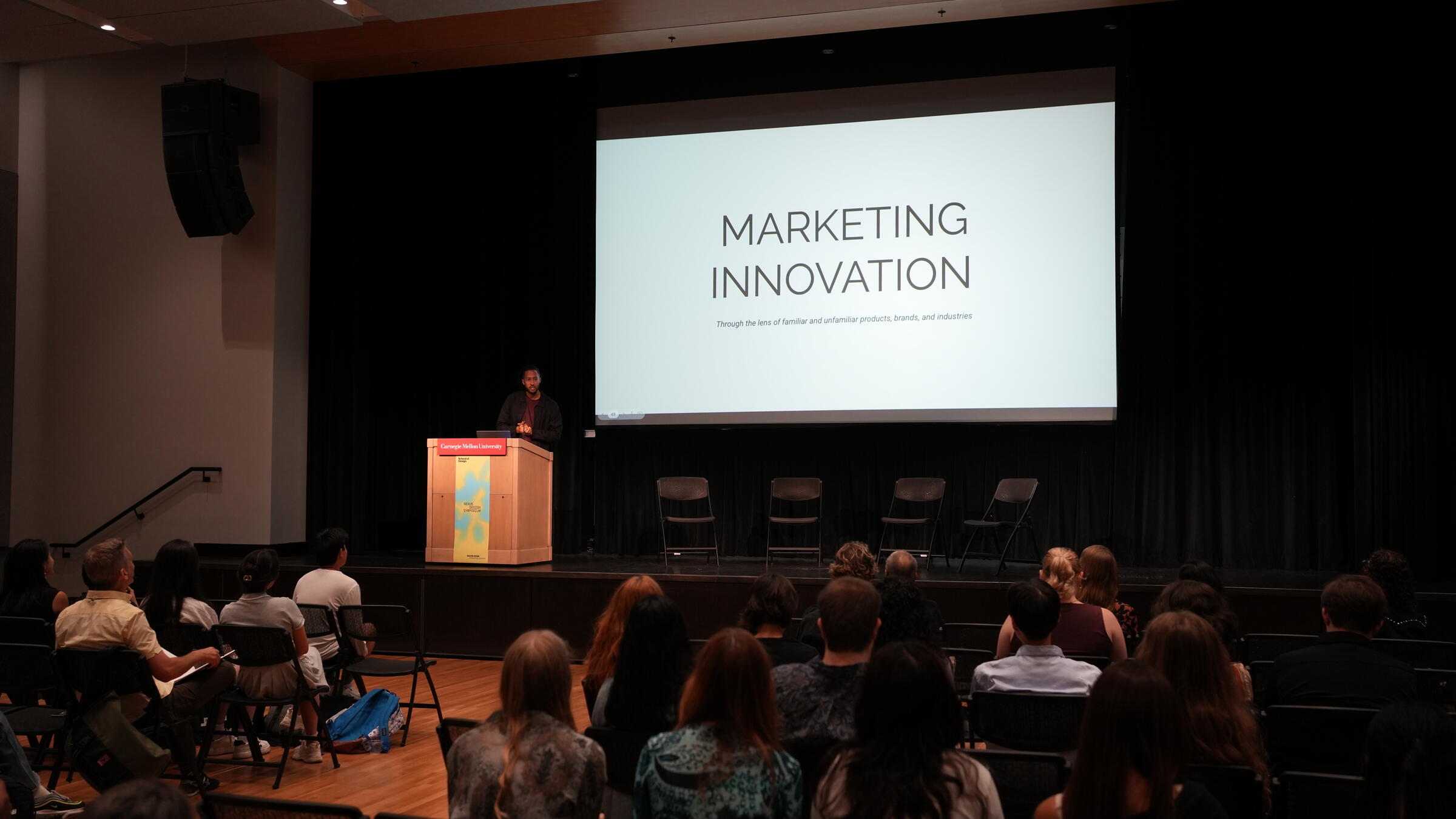 Nick Robinson speaking at the Nexus Design Symposium