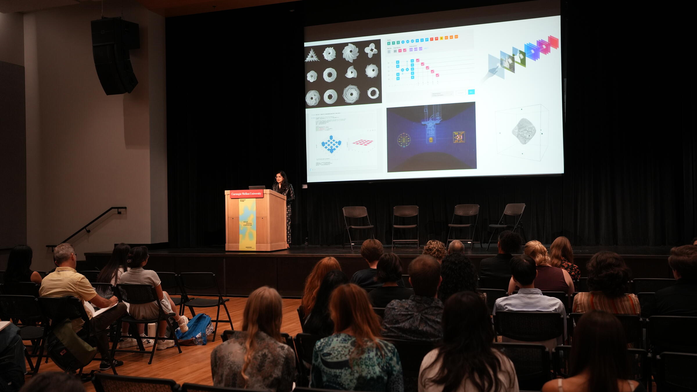 A speaker at the Nexus Design Symposium