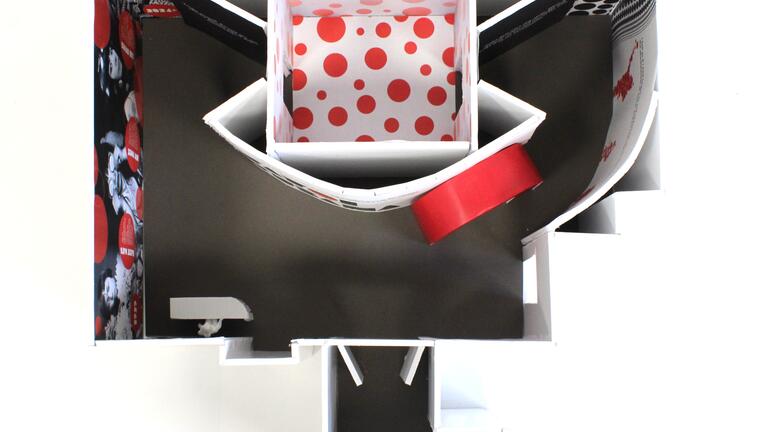 A model of a Yayoi Kusama exhibit