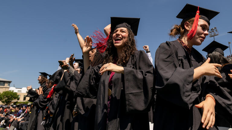 Graduates celebrating at commencement
