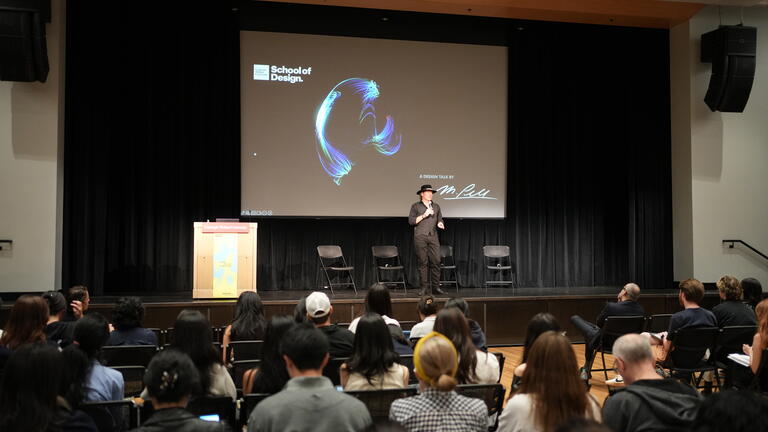 Mike Pell speaking at the Nexus Design Symposium