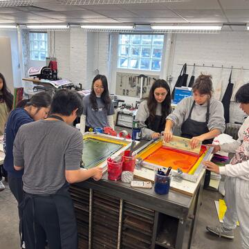 Students silkscreening in the 2D Lab
