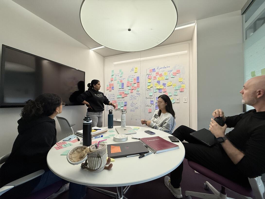 A team of students working in the Master's Studio