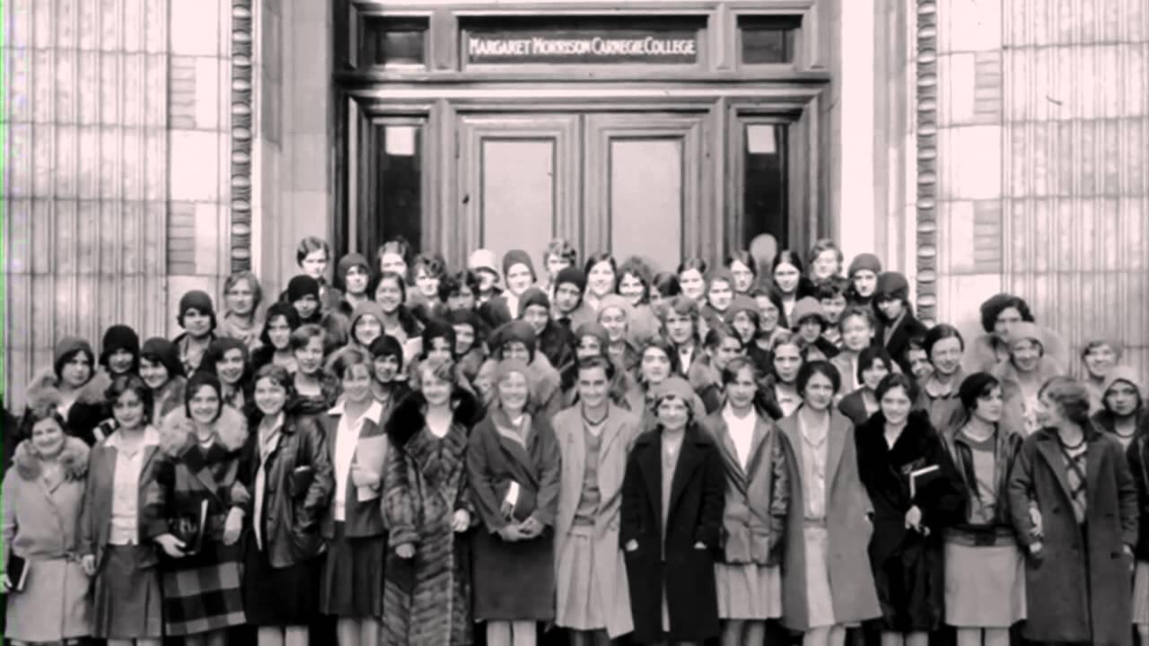 An old photo of a group of women in front of Margaret Morrison Carnegie Hall
